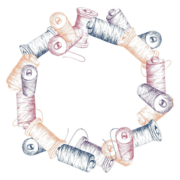 Нитки кольорові і голки поруч з ескізом вишивки